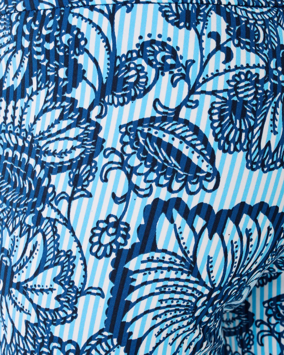 Blue floral pattern on a striped background