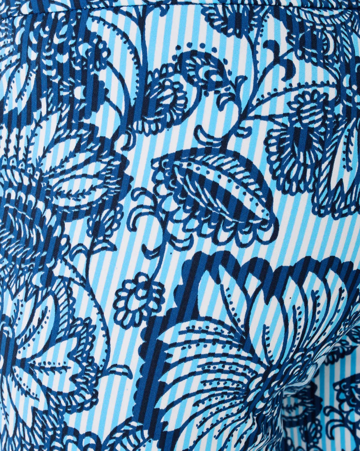 Blue floral pattern on a striped background