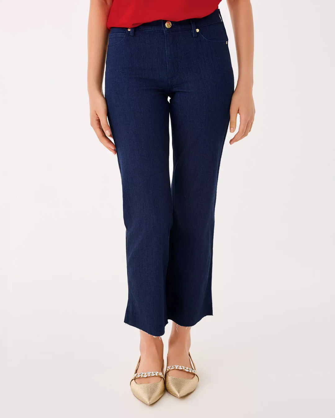 Navy blue pants worn by a person on a white background