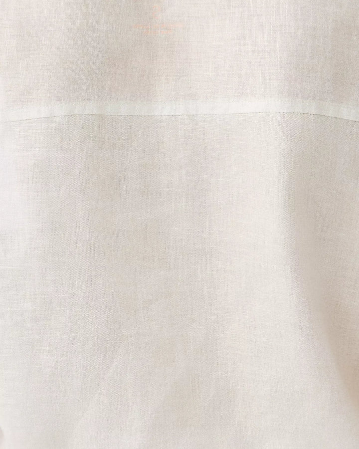 Close-up of a textured white fabric surface