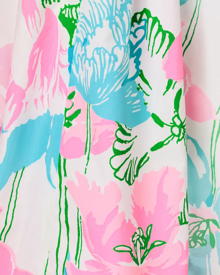 Floral pattern with pink, blue, and green flowers on a white background